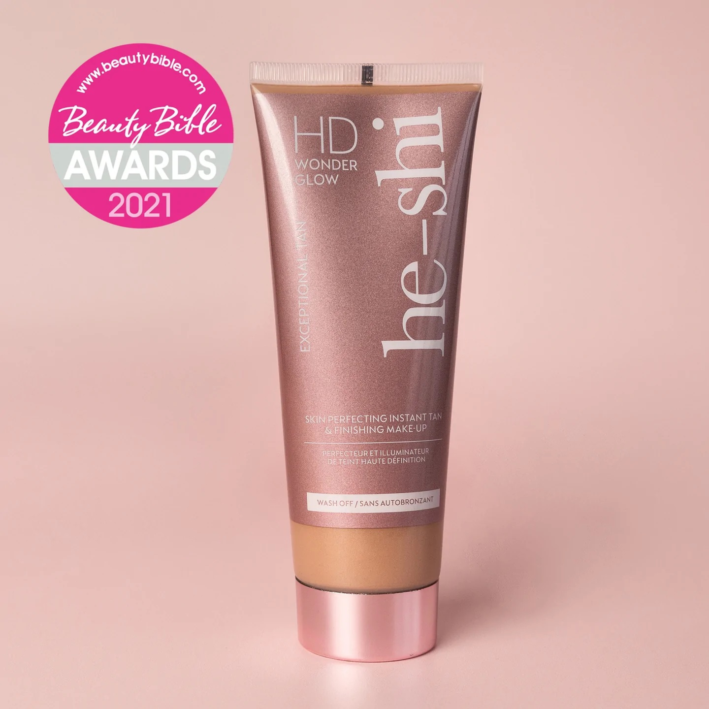 Image of He-Shi Wonder Glow tube on light pink background and featuring Beauty Bible Awards logo